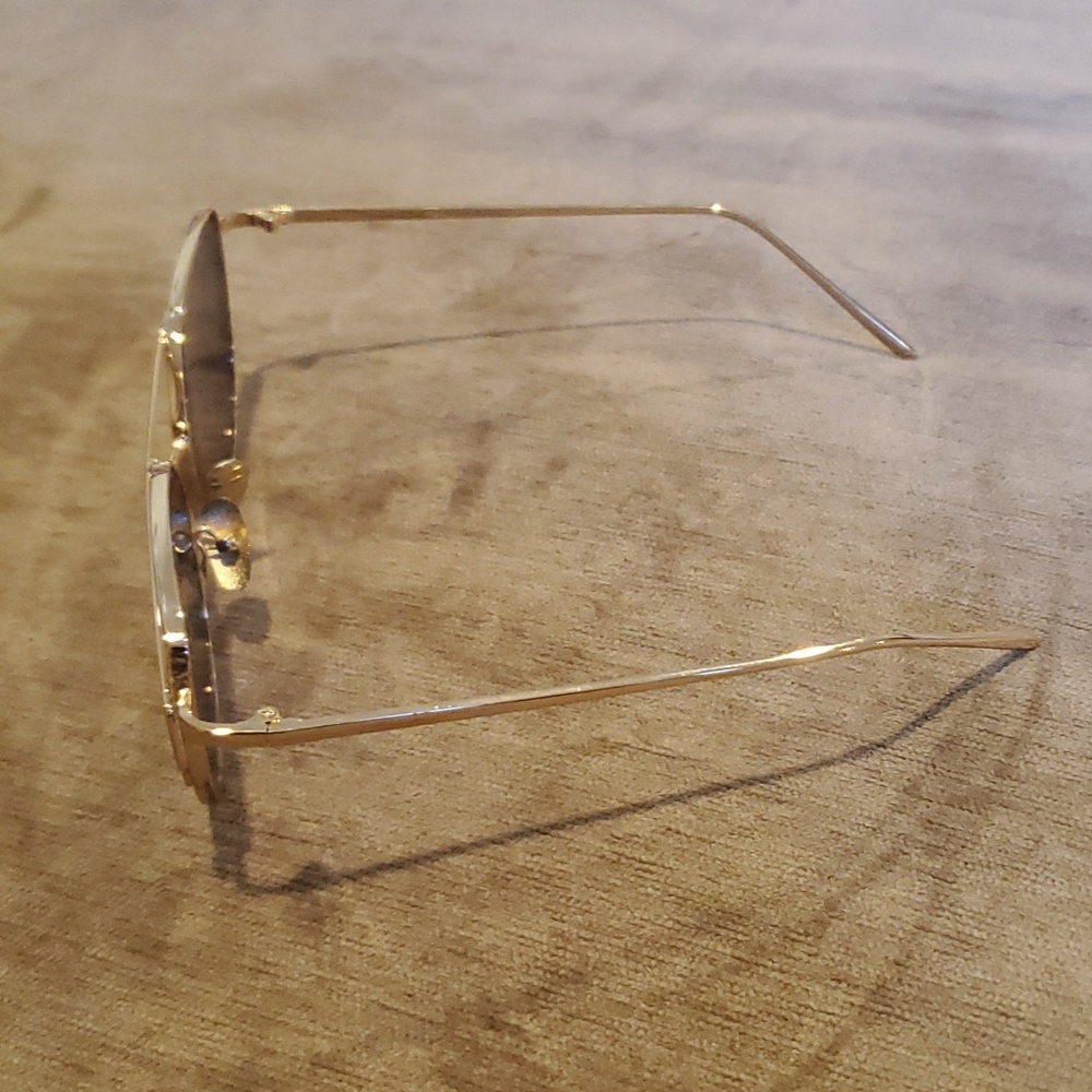 rose gold aviator-style sunglasses with gradient or reflective lenses. - Picture 3 of 4